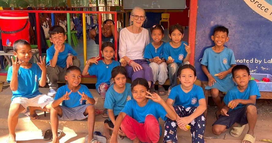 Volunteer with students